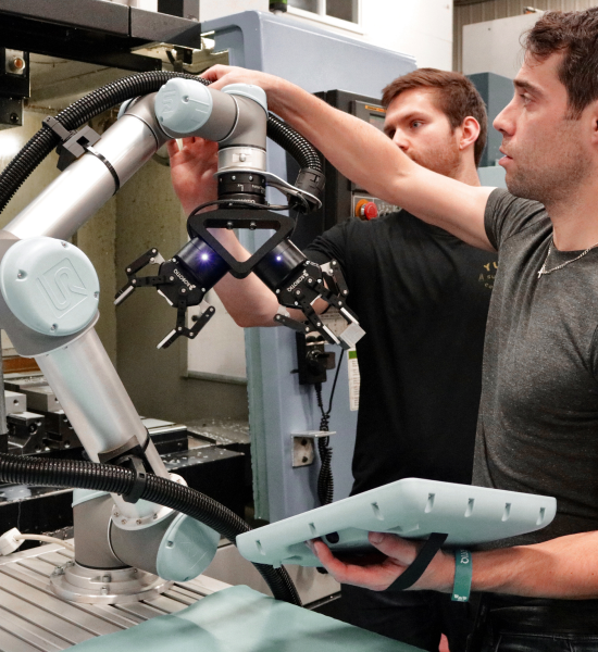 People Collaborating with CNC Robot People Collaborating with CNC Robot